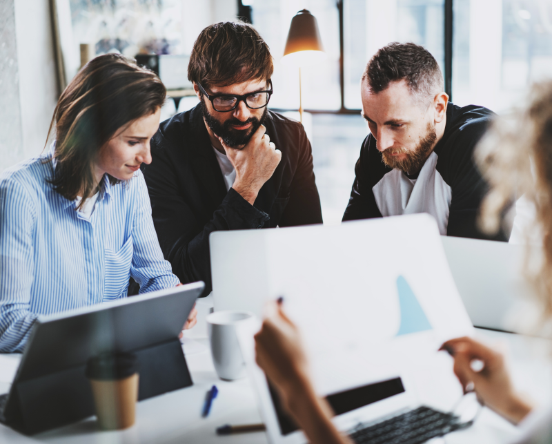 A team of engineers working in an office